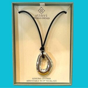 NWT ATTERRI WOMAN OWNED Silver‎ Modern Pendant on Black Rope Chain
